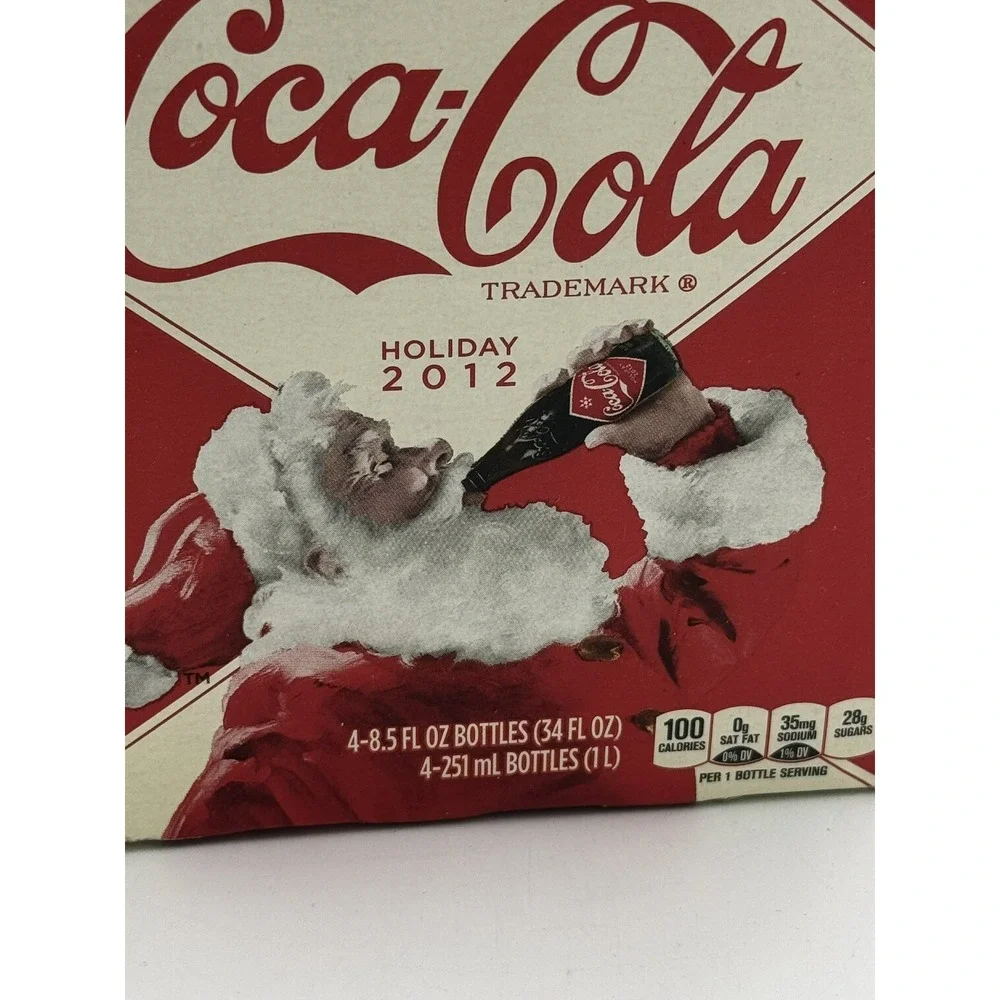 4 Pack of 2012 Coca-Cola Coke Christmas Santa Claus Holiday Full Bottles